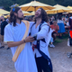 A guy dressed as assassin's creed assassin pretends to assassinate a guy dressed as Jesus at a Renaissance Faire.